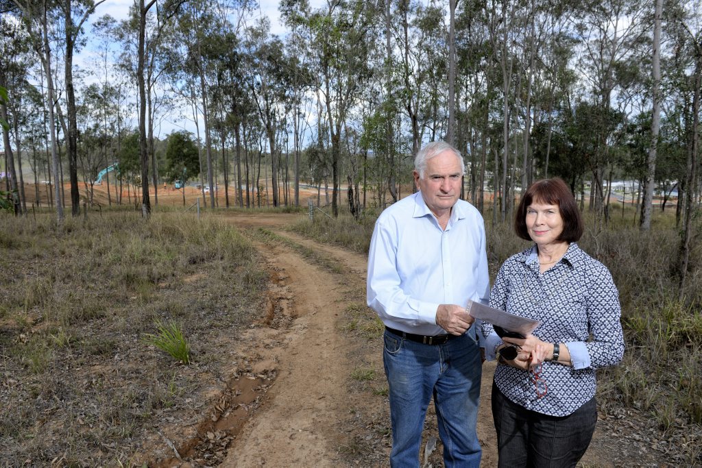 John and Kathryn Mahoney are disputing the government change made to their land in Deebing Heights. It has been changed from development purpose land to rural (with a lower value) despite development occurring on the property opposite (as seen behind). John and Kathryn Mahoney are disputing the government change made to their land in Deebing Heights. It has been changed from development purpose land to rural (with a lower value) despite development occurring on the property opposite (as seen behind).